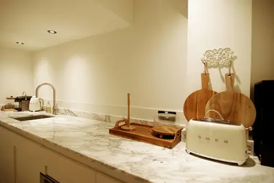 a kitchen with a counter top with a toaster and a toaster at Exceptional Stay in Jordaan Area in Amsterdam