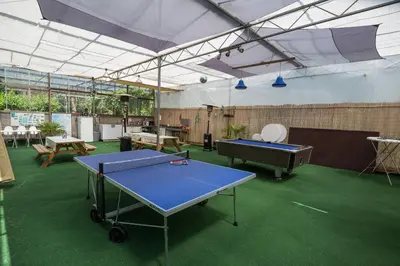 a tent with a ping pong table in a room at De Groote Wijzend in Lutjebroek