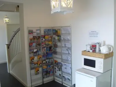 a display of a refrigerator in a kitchen at Badhotel Zeecroft in Wijk aan Zee