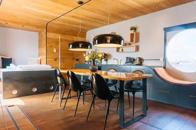 a dining room with a table and chairs at Botel in Amsterdam
