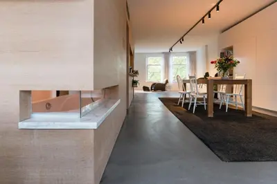 a room with a table and a dining room at City centre Loft on the historic Canal in Utrecht
