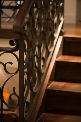 a set of stairs with a wrought iron railing at Dikker & Thijs Hotel in Amsterdam