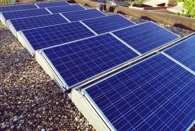 a group of blue solar panels on top of rocks at Eco lodge Utrecht Leidsche Rijn in Utrecht