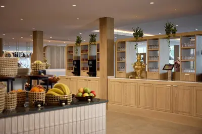 a kitchen with baskets of fruit on a counter at Van der Valk Hotel Volendam - Recently renovated in Volendam