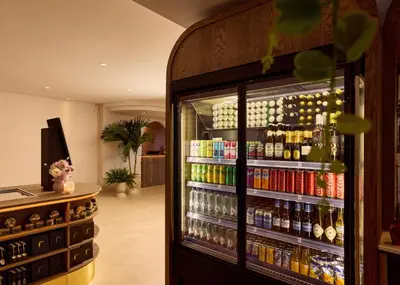 a store with a refrigerator filled with lots of drinks at Van der Valk Hotel Volendam - Recently renovated in Volendam