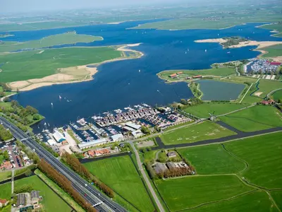 an aerial view of a river and a city at Apartment Westergeest Luxe by Interhome in Uitgeest
