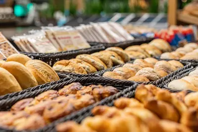 a bunch of different types of pastries on display at Hotel Woudschoten in Zeist