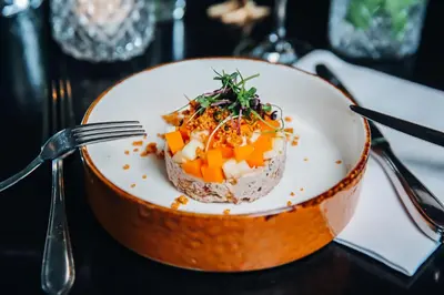 a plate of food on a table at Van der Valk Hotel Leiden in Leiden