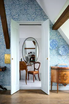 a room with a piano and a mirror at Landgoed Huis te Jaarsveld in Jaarsveld