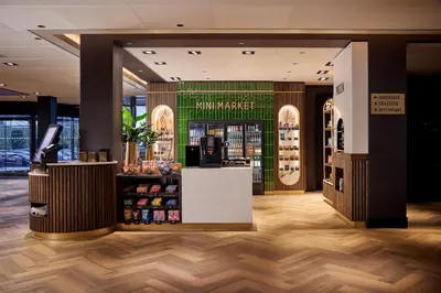 a store with a supermarket with a counter and a pharmacy at Van der Valk Hotel Breukelen in Breukelen