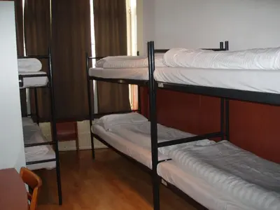 a group of bunk beds in a room at Hotel Continental Amsterdam in Amsterdam