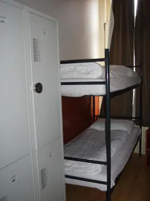 a couple of bunk beds in a room at Hotel Continental Amsterdam in Amsterdam