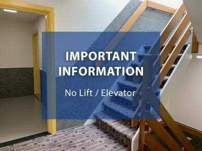 an image of a staircase with a sign that says important information at Hotel The Globe in Amsterdam