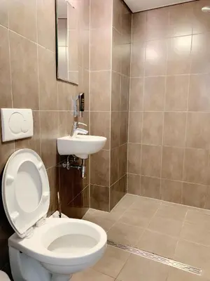 a bathroom with a toilet and a sink at Hotel The Globe in Amsterdam