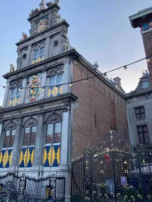 a building with a clock tower on top of it at City-beach apartment nearby Amsterdam in Hoorn
