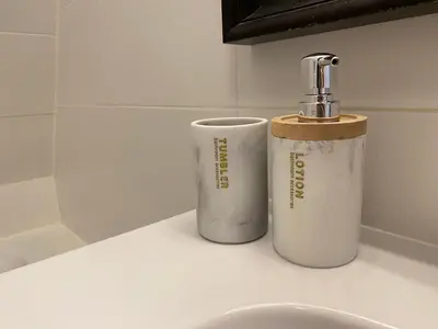 two rolls ofodorizers sitting on a counter next to a sink at Katwijk Center, 1 min away from the beach! in Katwijk aan Zee