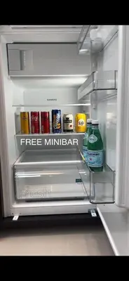 an open refrigerator filled with food and drinks at B&B Urban Oasis with Free Parking in Amsterdam