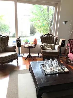 a living room with chairs and a table and a chessboard at Great House for Two in Amsterdam in Amsterdam
