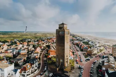 an aerial view of a city with a clock tower at Loft 29 in Zandvoort