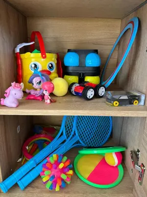 a wooden shelf with toys and toys on it at NEW - The Surf Shack - on a lake near Amsterdam! in Vinkeveen