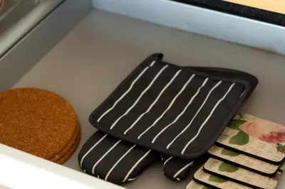 a drawer with three different types of items in it at Spacious private apartement, 25min from Amsterdam in Hilversum