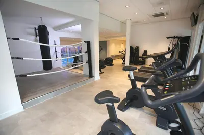a gym with a bunch of gym equipment in a room at Van der Valk Hotel Akersloot / A9 ALKMAAR in Akersloot