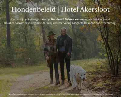 a man and a woman walking a dog on a trail at Van der Valk Hotel Akersloot / A9 ALKMAAR in Akersloot
