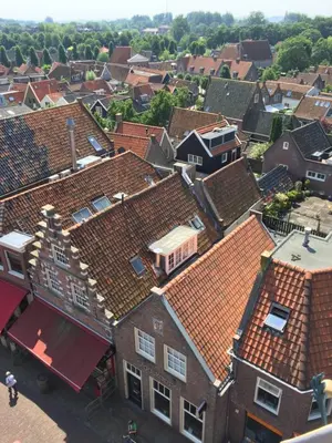 an overhead view of a town with roofs at Waterland Vakantiehuis in Monnickendam