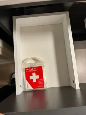 a small box with a red sign in it at Best Neighbourhood Apartment in Amsterdam