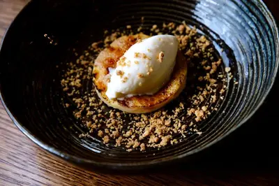 a bowl of food with a dessert in it at Boetiekhotel De Kastanjehof in Lage-Vuursche