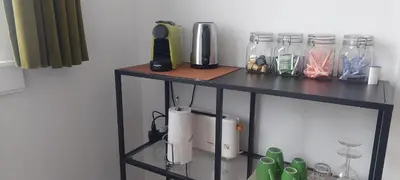 a black shelf with items on top of it at Bickersbed in Amsterdam