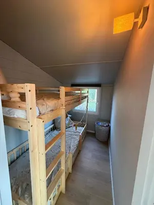 a bunk bed in a tiny house at Beautiful house on an island near Amsterdam in Oude Meer