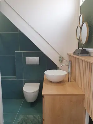 a bathroom with a sink and a toilet at Seapearl in Zandvoort