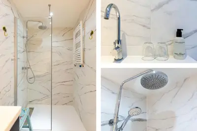 a bathroom with a shower and a sink at B&B Blossom in Amsterdam