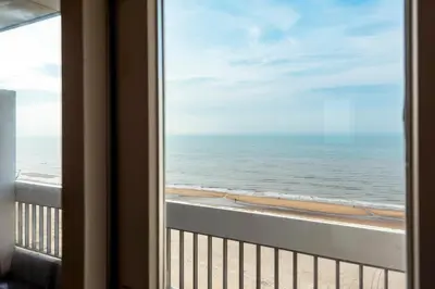 a view of the ocean from a room with a window at Seaside in Zandvoort