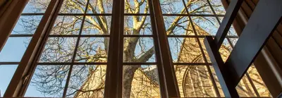 a view of the eiffel tower through a window at Hofje van Sint Jan in Gouda