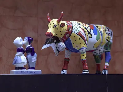 a figurine of a cow on top of a table at Mozart Hotel in Amsterdam