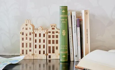 a group of books sitting on a table at Hotel Station Amstelveen in Amstelveen