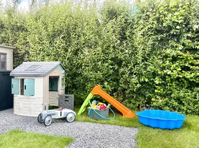 a childs play area with a dog house and a toy at NEW - Waterhouse Linada on a lake near Amsterdam in Vinkeveen