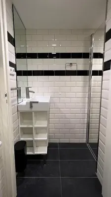a bathroom with a sink and a shower at Seastreet Robert in Zandvoort