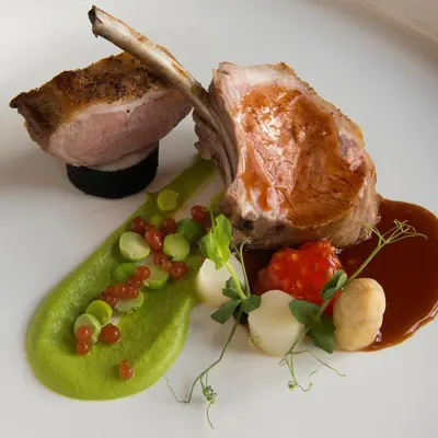 a plate of food with meat and vegetables on a plate at l'Auberge Damhotel in Edam