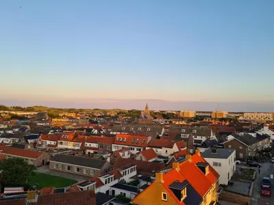 an aerial view of a city with buildings at Sterflat 151 in Egmond aan Zee