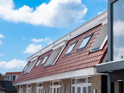a building with a red roof at Heeren van Noortwyck in Noordwijk aan Zee