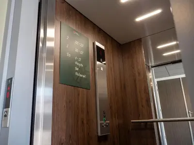 a chalk board on the wall of a elevator at Heeren van Noortwyck in Noordwijk aan Zee