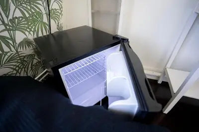 a laptop computer sitting on top of a table at Your own floor in authentic picturesque dikehouse - dijkhuis181 in Amsterdam