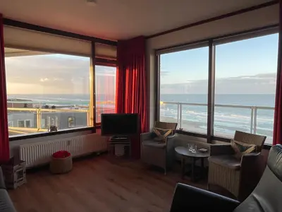 a hotel room with a view of the ocean at Sterflat 207 in Egmond aan Zee