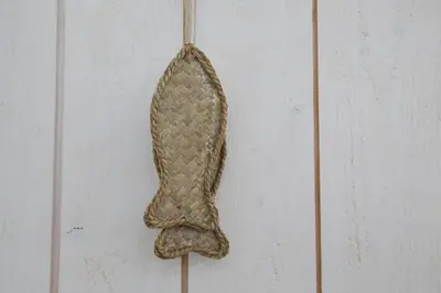a glove hanging on a piece of wood at Sterflat 241 in Egmond aan Zee