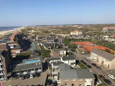 an aerial view of a city with a street at Sterflat 259 in Egmond aan Zee