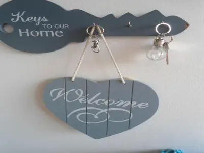 a heart keychain with the wordskey to our home andaccoacco at Halte71 in Zandvoort