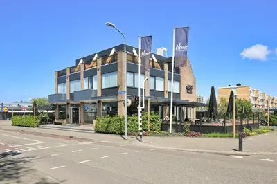 a building on the side of a street at Boutique Hotel Hans - Amsterdam Schiphol Airport in Badhoevedorp
